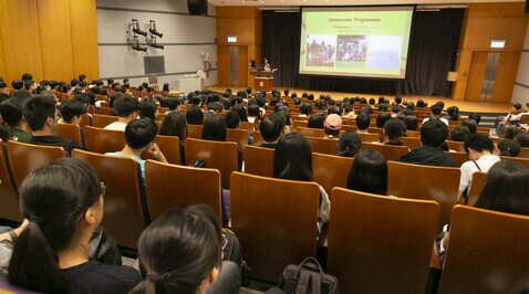 audience listening to admissions talk