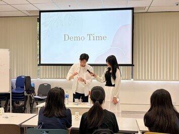 Student representatives conduct a demonstration during the workshop on speech therapy.
