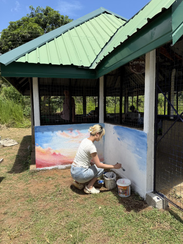 HKU students working on the mural on the Together House - look at the beautiful colours!