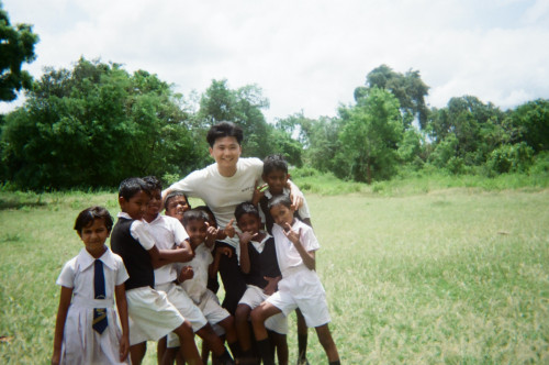 Playing with the students at in the beautiful vast land of green.